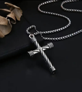 Spiraling Steel Cross necklace