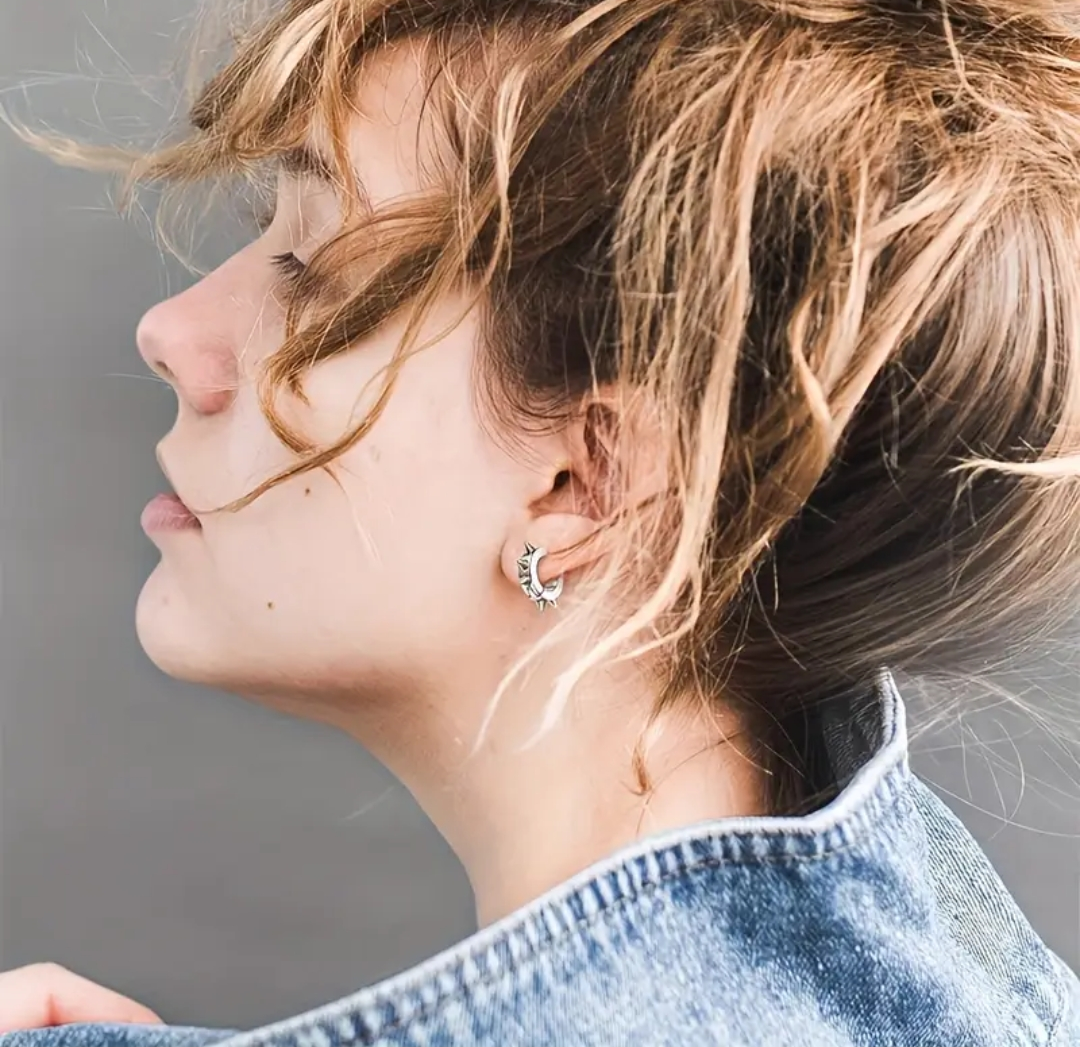 Spiked steel loop earrings